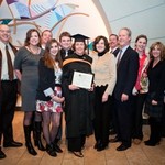 Norine Cunningham celebrates the Pew Teaching Excellence Award for Part-Time Faculty with her family